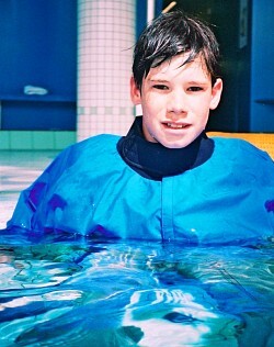 sit-up in shallow water pool with canoeing cagoule anorak