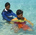 RESCUES, 4 DOUBLE SHOULDER TOW
Hold the casualty below the shoulders and swim with backstroke 4