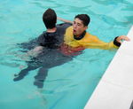 RESCUES, CASUALTY, CONSCIOUS, TOW, 4 CROSS CHEST TOW
Support the casualty on the poolside and assist them out 9